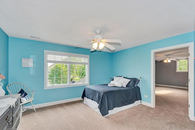 24155 S Blackhawk Ln, Manhattan, IL 60442 - bedroom featuring light colored carpet, multiple windows, and ceiling fan