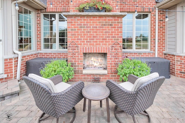 24155 S Blackhawk Ln, Manhattan, IL 60442 - view of patio / terrace featuring a brick fireplace