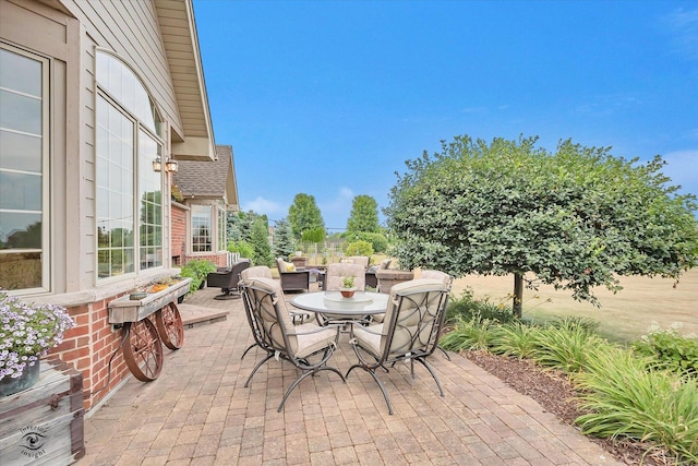 24155 S Blackhawk Ln, Manhattan, IL 60442 - view of patio / terrace with outdoor dining space