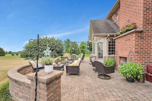24155 S Blackhawk Ln, Manhattan, IL 60442 - view of patio featuring an outdoor living space