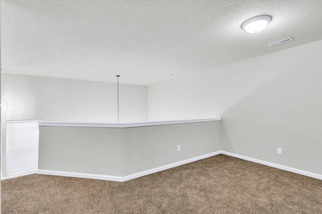 412 Doisy Ln, Champaign, IL 61822 - carpeted spare room with a textured ceiling and baseboards