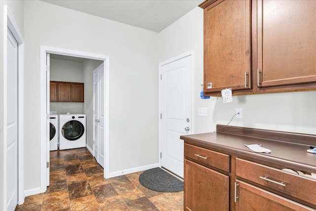 412 Doisy Ln, Champaign, IL 61822 - washroom with separate washer and dryer, stone finish floors, and cabinet space