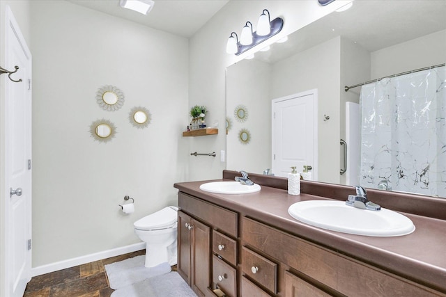 412 Doisy Ln, Champaign, IL 61822 - full bathroom with double vanity, stone finish flooring, and curtained shower