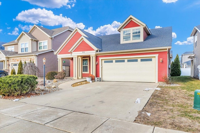 412 Doisy Ln, Champaign, IL 61822 - view of front of property with concrete driveway and an attached garage