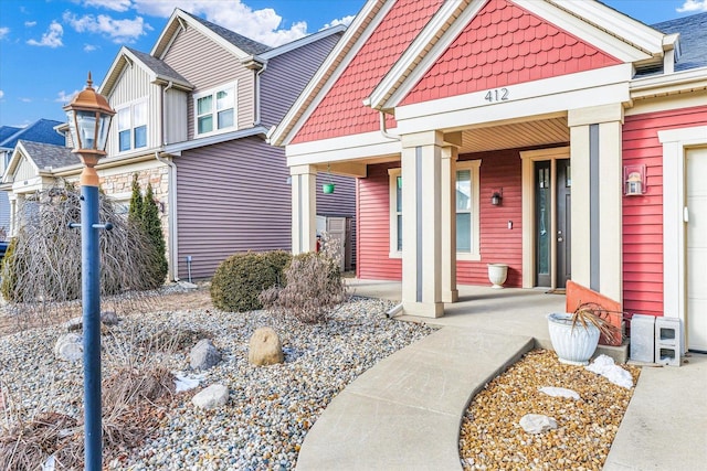 412 Doisy Ln, Champaign, IL 61822 - craftsman-style home featuring covered porch