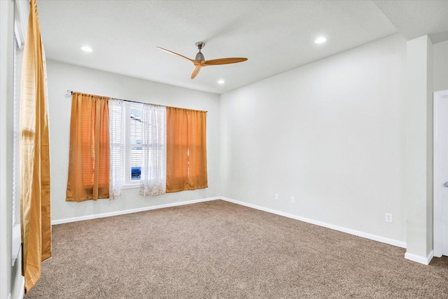 412 Doisy Ln, Champaign, IL 61822 - carpeted spare room featuring a ceiling fan and recessed lighting