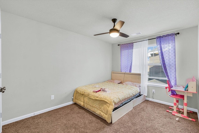 412 Doisy Ln, Champaign, IL 61822 - bedroom featuring carpet flooring, a ceiling fan, and a textured ceiling