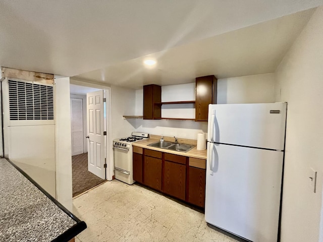 2948 E 95th St, Chicago, IL 60617 - kitchen with white appliances, open shelves, a heating unit, light flooring, and light countertops