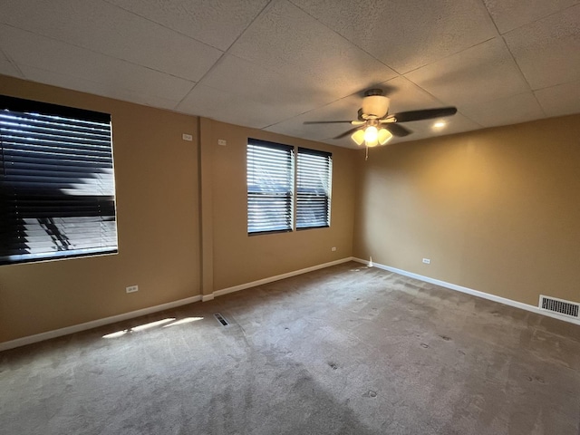 2948 E 95th St, Chicago, IL 60617 - carpeted spare room featuring ceiling fan and baseboards