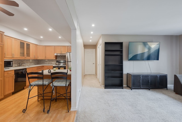 717 Tipperary Ct Unit 2B, Schaumburg, IL 60193 - kitchen with dishwasher, gas stove, recessed lighting, freestanding refrigerator, and glass insert cabinets