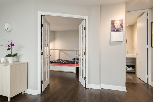 345 W Fullerton Pkwy Unit 1706, Chicago, IL 60614 - hallway featuring french doors and dark wood-style flooring
