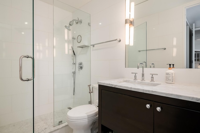 345 W Fullerton Pkwy Unit 1706, Chicago, IL 60614 - bathroom with a stall shower, vanity, and tile walls