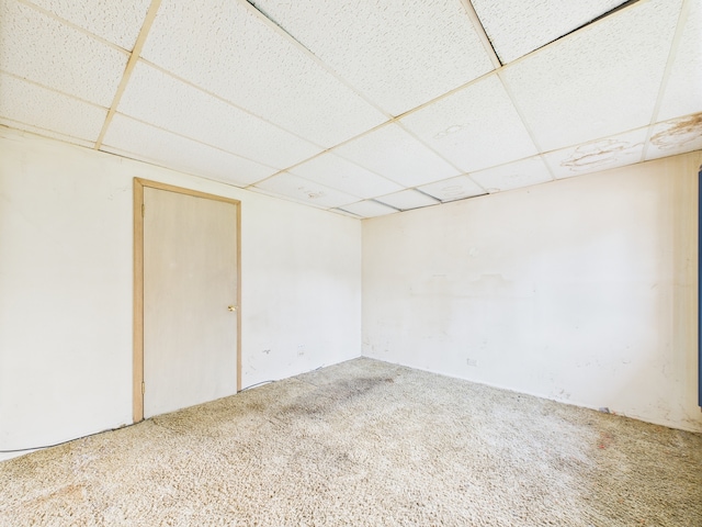 2404 Sigwalt St, Rolling Meadows, IL 60008 - carpeted empty room with a drop ceiling