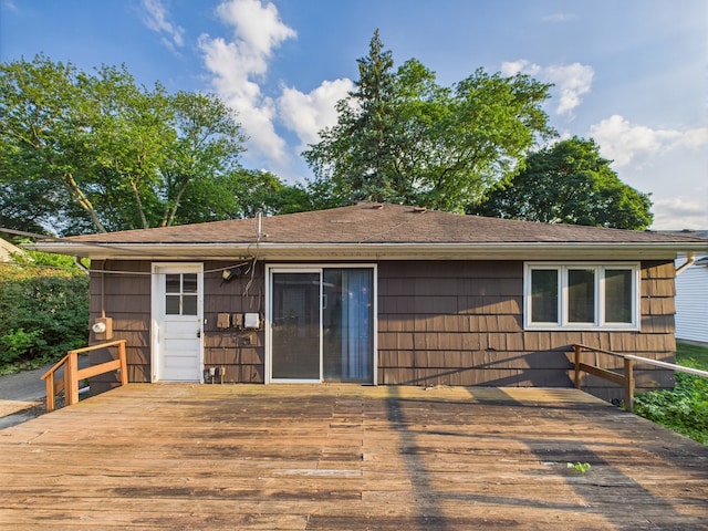 2404 Sigwalt St, Rolling Meadows, IL 60008 - rear view of property featuring a wooden deck and roof with shingles