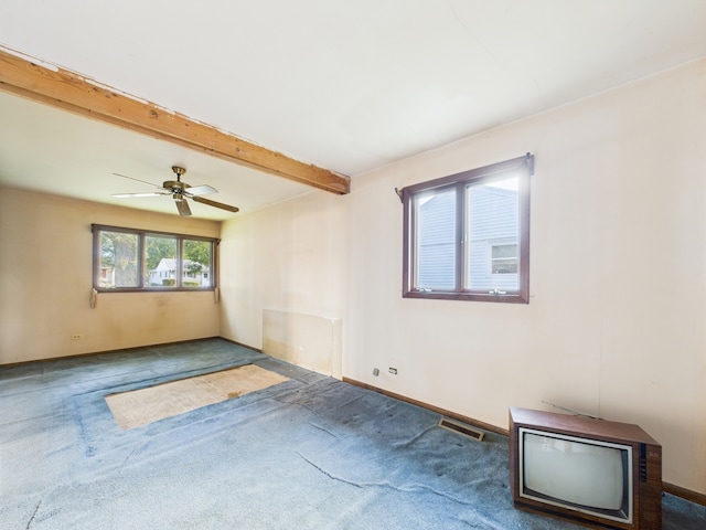 2404 Sigwalt St, Rolling Meadows, IL 60008 - empty room featuring carpet floors, beamed ceiling, and ceiling fan