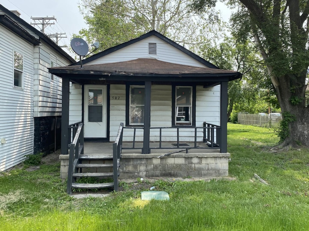 500-502 S Ottawa St, Joliet, IL 60436 - view of front of home with a porch and a shingled roof