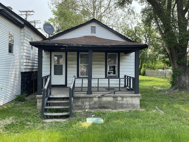 500-502 S Ottawa St, Joliet, IL 60436 - view of front of home with a porch and a shingled roof