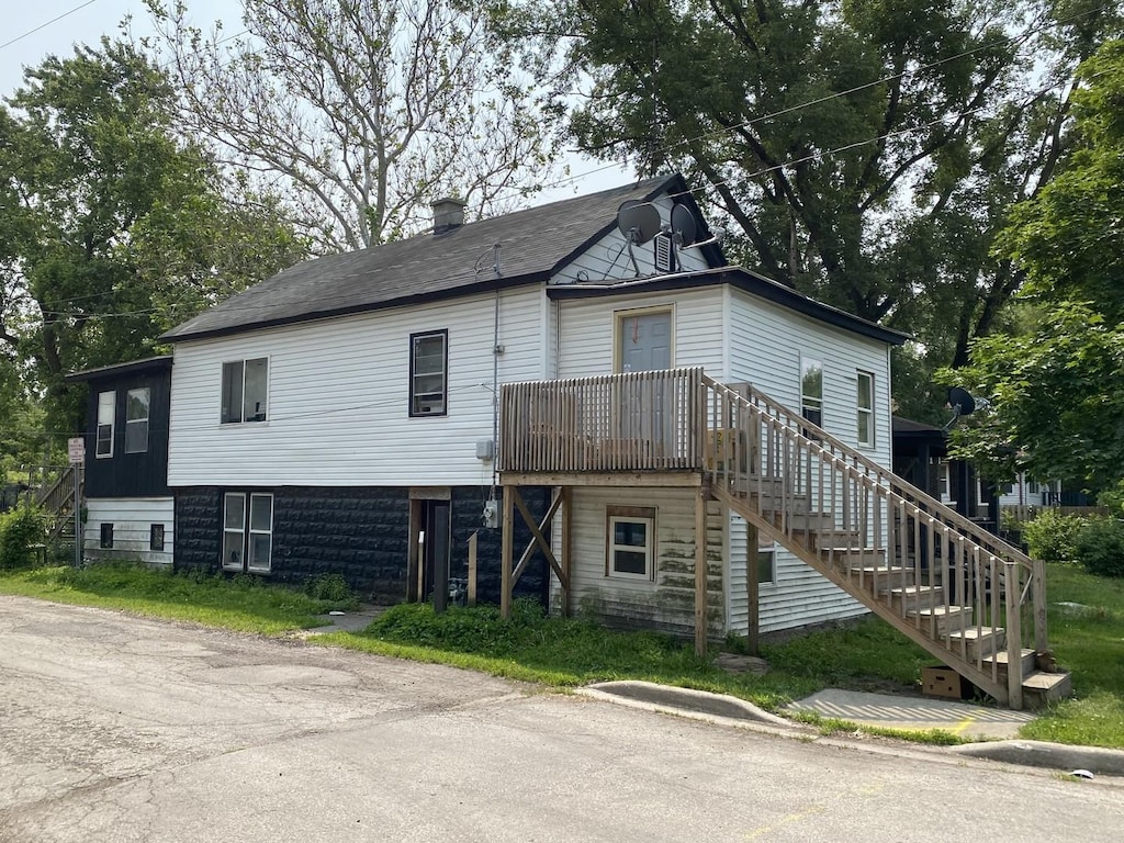500-502 S Ottawa St, Joliet, IL 60436 - view of front of house with stairs and a chimney