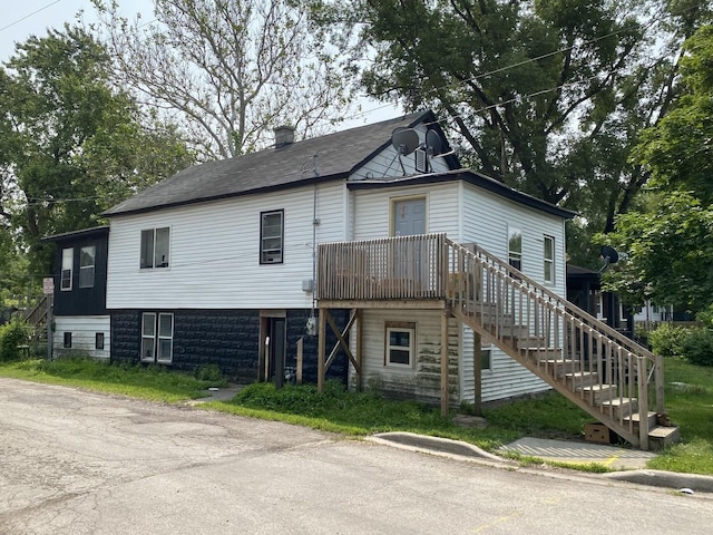 500-502 S Ottawa St, Joliet, IL 60436 - view of front of house with stairs and a chimney