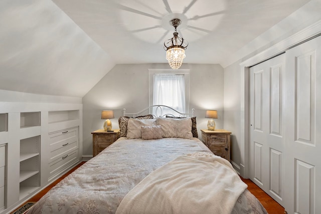 506 E Russell St, Barrington, IL 60010 - bedroom with lofted ceiling, a chandelier, and dark wood-style flooring