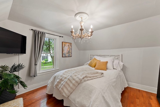 506 E Russell St, Barrington, IL 60010 - bedroom with lofted ceiling, a chandelier, and wood finished floors