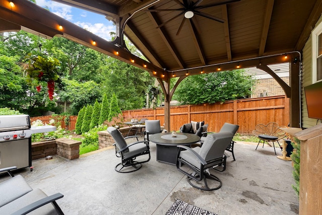 506 E Russell St, Barrington, IL 60010 - fenced backyard with a patio area, ceiling fan, and outdoor dining area