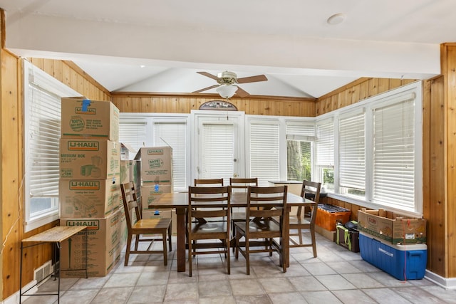 21368 W Pepper Dr, Lake Zurich, IL 60047 - dining room with lofted ceiling, wooden walls, plenty of natural light, and a ceiling fan