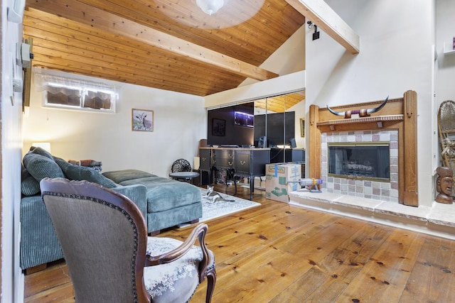 21368 W Pepper Dr, Lake Zurich, IL 60047 - living area featuring hardwood / wood-style flooring, a tiled fireplace, and wooden ceiling