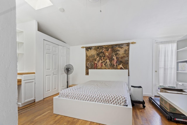 21368 W Pepper Dr, Lake Zurich, IL 60047 - bedroom featuring wood finished floors, a skylight, and a closet