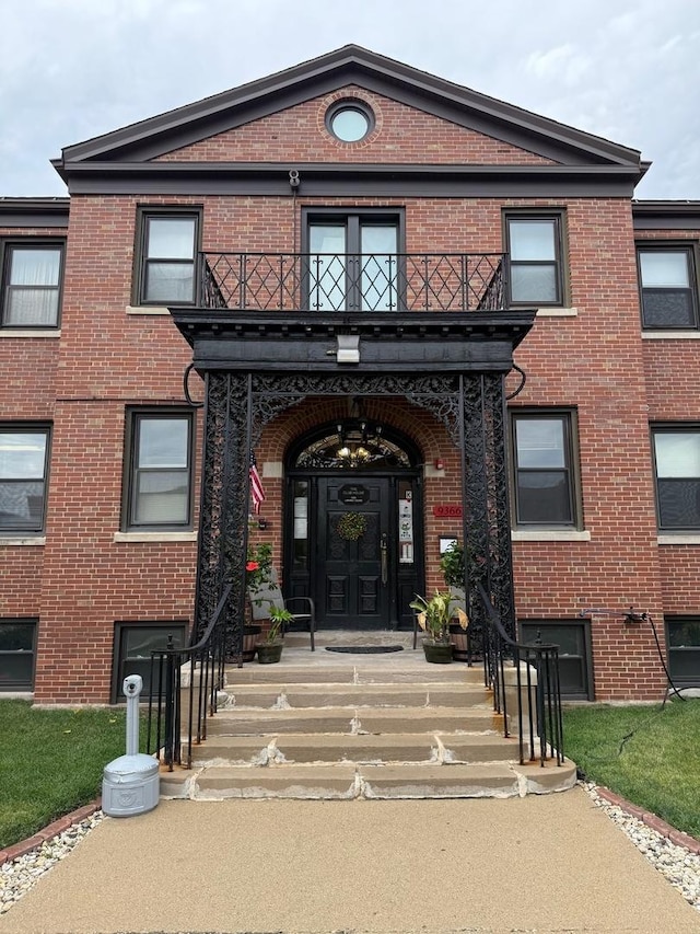 9377 Landings Ln Unit 502, Des Plaines, IL 60016 - property entrance with a balcony and brick siding