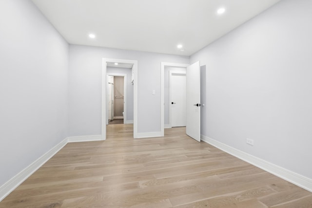 974 Crabapple Dr Unit 308, Prospect Heights, IL 60070 - unfurnished bedroom featuring recessed lighting and light wood-type flooring