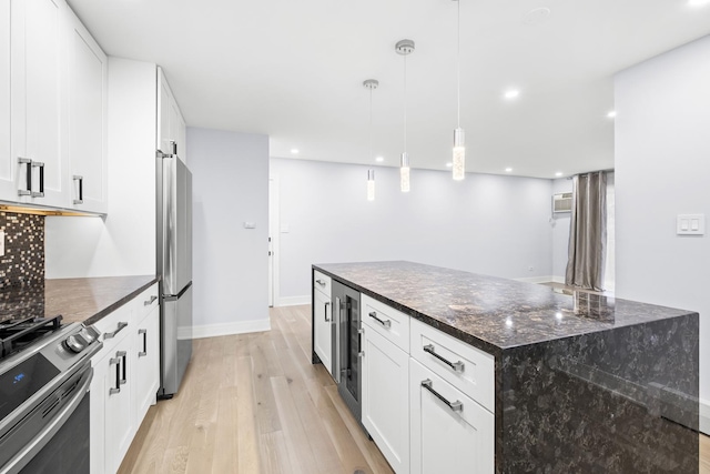 974 Crabapple Dr Unit 308, Prospect Heights, IL 60070 - kitchen with stainless steel appliances, light wood-type flooring, beverage cooler, white cabinets, and recessed lighting