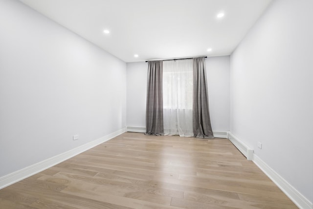 974 Crabapple Dr Unit 308, Prospect Heights, IL 60070 - empty room with light wood-type flooring, recessed lighting, and baseboard heating