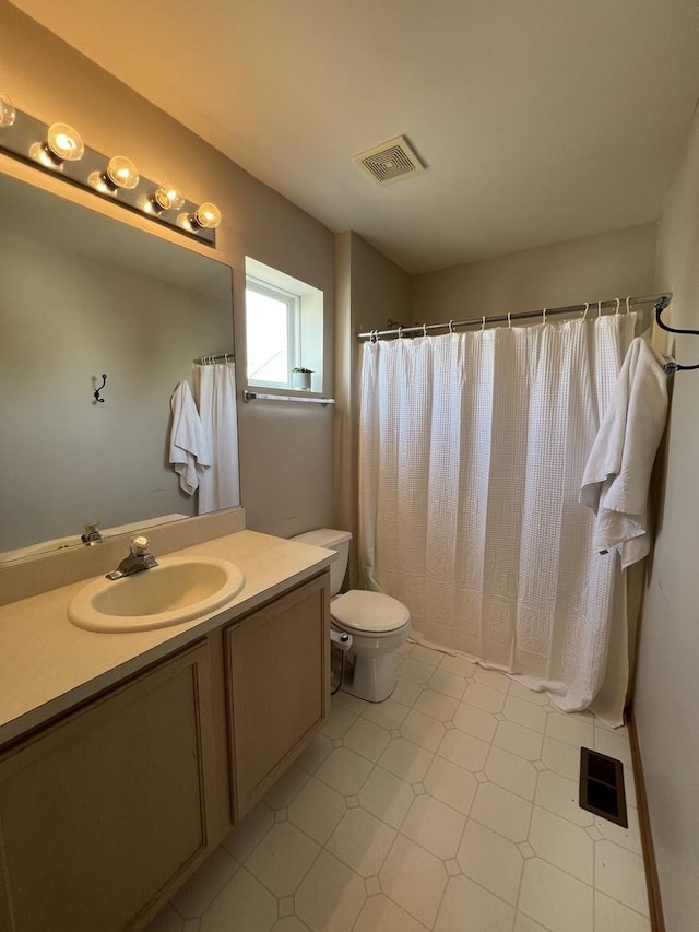 163 Mountain Laurel Ct, Romeoville, IL 60446 - bathroom with tile patterned floors, vanity, and a shower with shower curtain