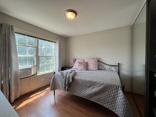 163 Mountain Laurel Ct, Romeoville, IL 60446 - bedroom with cooling unit and wood finished floors