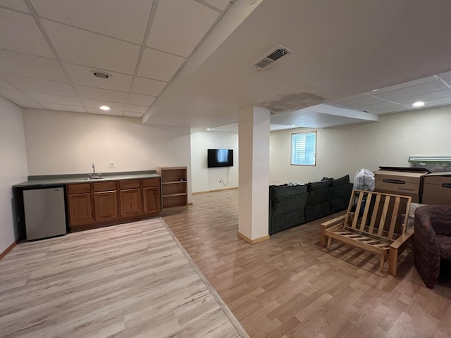 163 Mountain Laurel Ct, Romeoville, IL 60446 - bar featuring light wood finished floors, a drop ceiling, dishwasher, refrigerator, and recessed lighting