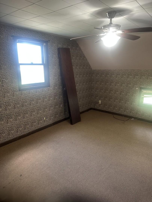 201 E N St, Saybrook, IL 61770 - bonus room featuring a ceiling fan, light colored carpet, wallpapered walls, and lofted ceiling