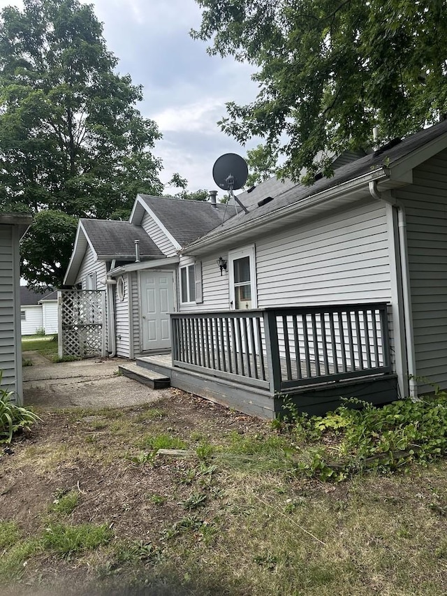 201 E N St, Saybrook, IL 61770 - rear view of house featuring a wooden deck