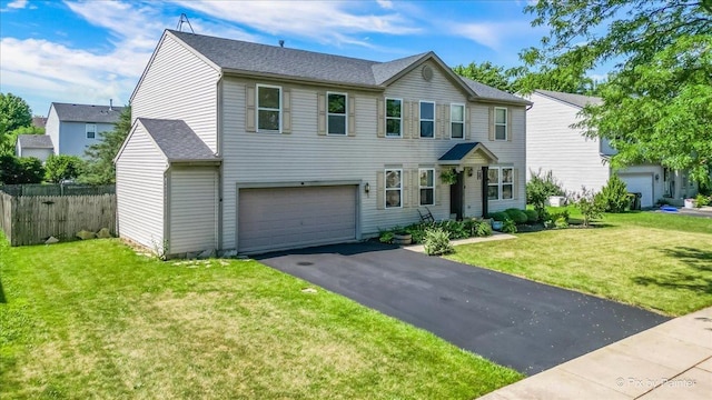 243 Johnson St, Hampshire, IL 60140 - view of front of house featuring an attached garage, driveway, and a shingled roof