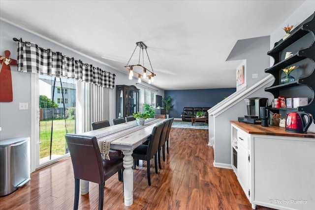243 Johnson St, Hampshire, IL 60140 - dining space featuring dark wood-style flooring