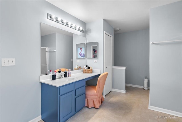 243 Johnson St, Hampshire, IL 60140 - bathroom featuring vanity and a shower with door