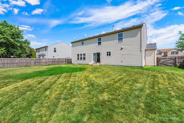 243 Johnson St, Hampshire, IL 60140 - back of property with a fenced backyard and entry steps