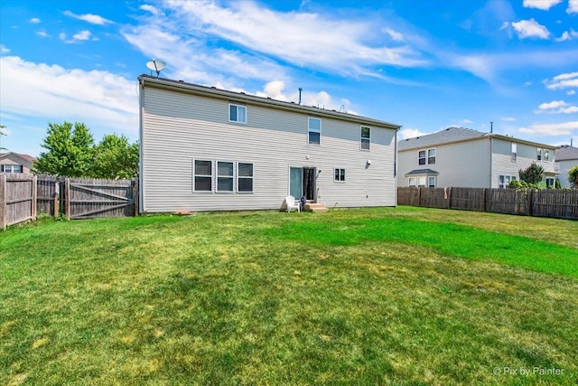 243 Johnson St, Hampshire, IL 60140 - back of property featuring a fenced backyard and entry steps