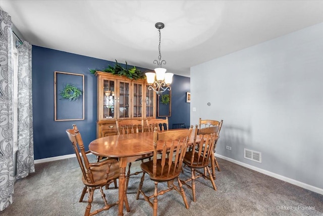 243 Johnson St, Hampshire, IL 60140 - dining space featuring a chandelier and carpet floors