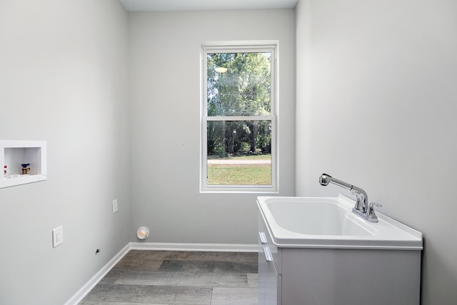 121 Pine St, Buckingham, IL 60917 - laundry area featuring wood finished floors and hookup for a washing machine