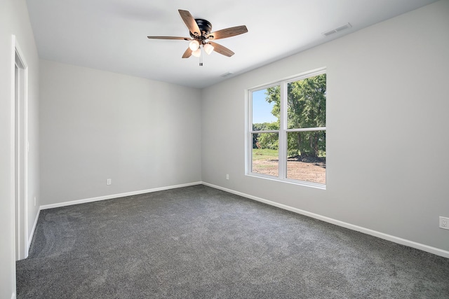 121 Pine St, Buckingham, IL 60917 - empty room featuring ceiling fan and dark colored carpet