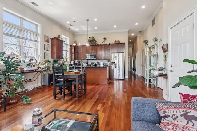 3234 N California St Unit 3S, Chicago, IL 60618 - living room featuring crown molding, dark wood finished floors, and recessed lighting