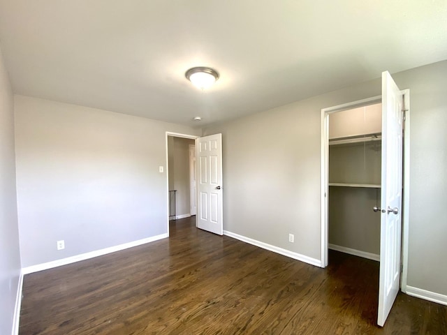 16009 Debbie Ln, South Holland, IL 60473 - unfurnished bedroom with wood finished floors and a walk in closet