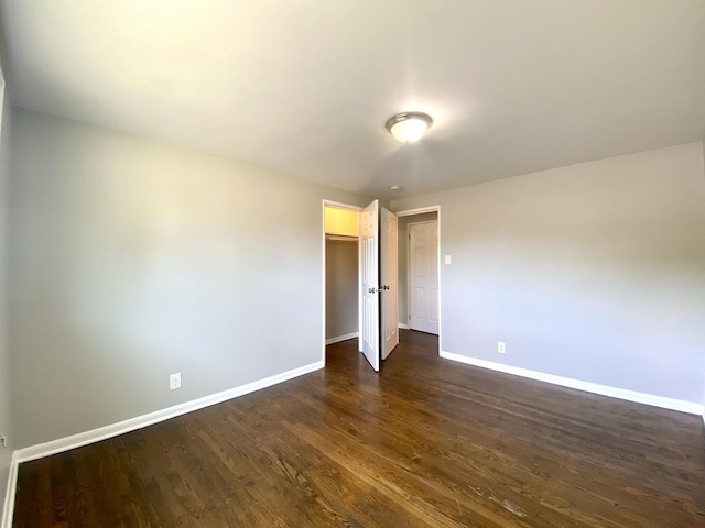 16009 Debbie Ln, South Holland, IL 60473 - unfurnished room featuring baseboards and dark wood-type flooring