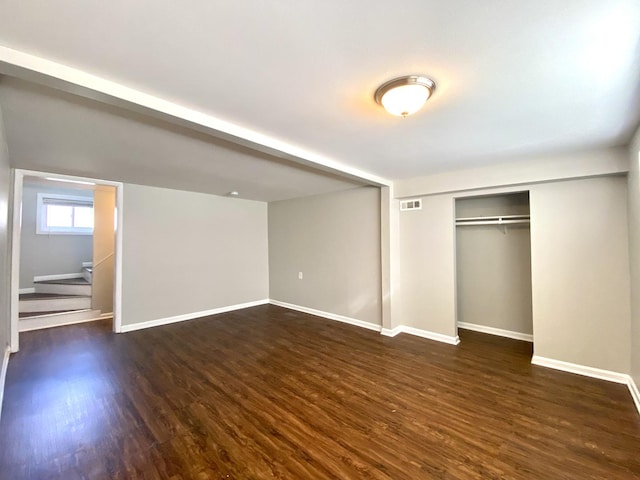 16009 Debbie Ln, South Holland, IL 60473 - below grade area with dark wood-type flooring and stairway